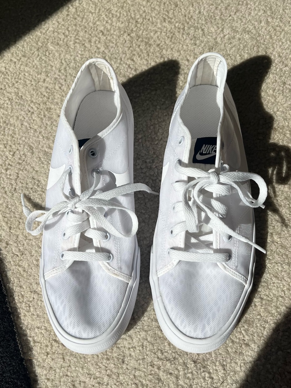 Nike Women’s White Canvas Sneakers
Size 10
Never Worn